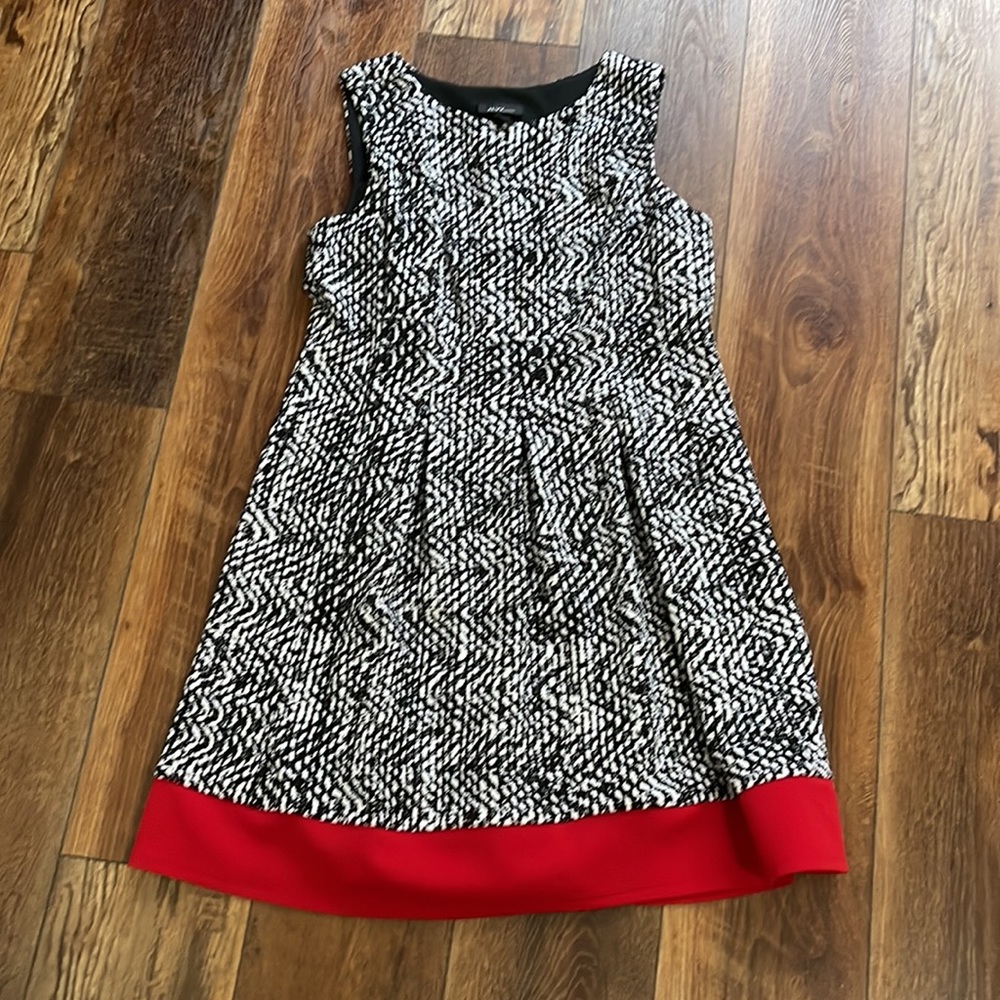 Alyx Petite. Size 16P. Black and white dress with red trim at the bottom.